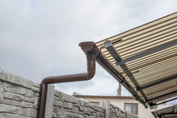 Plastic Downspout Installation in Grayson